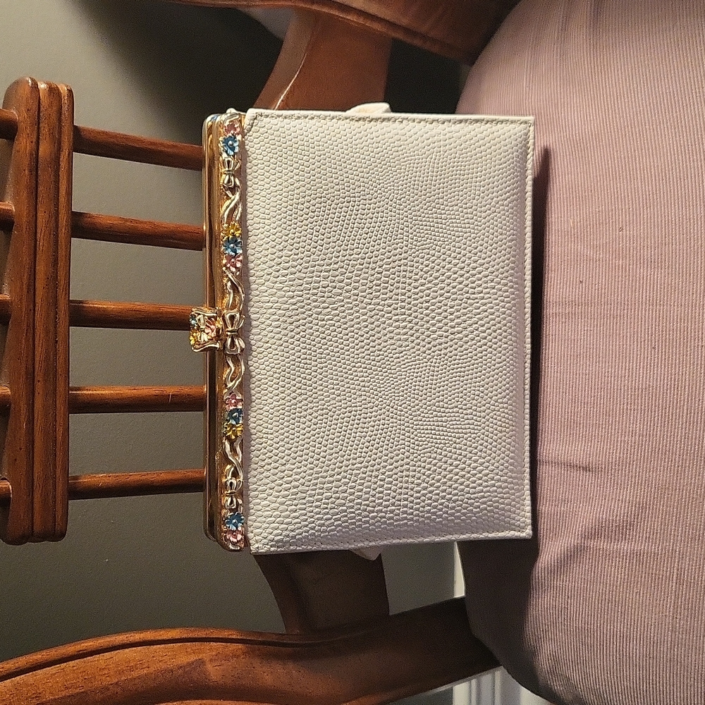 Genuine leather vintage white snakeskin clutch with gold accents.